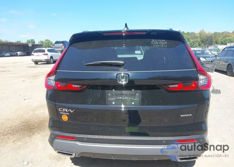 2023 Honda Cr-V Hybrid Sport Touring z USA, uszkodzony, nr VIN 7FARS6H96PE012595